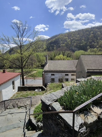 Historic Harpers Ferry buildings overlooking the valley with mountains behind