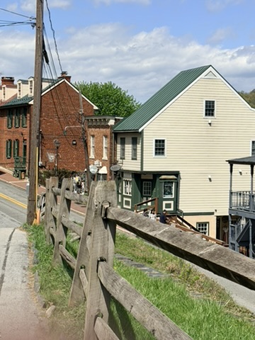 Historic Lower Town street in Harpers Ferry with preserved buildings