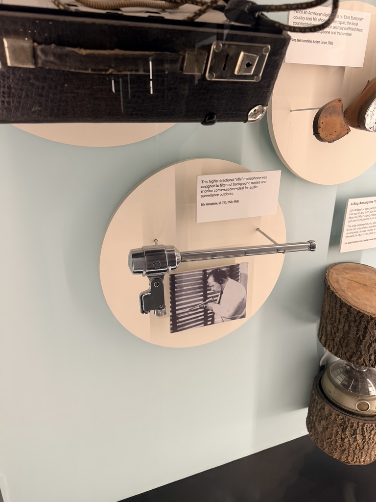 Spy Museum exhibit showing a directional rifle microphone used for Cold War audio surveillance